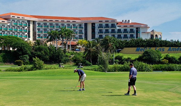 People golfing on the pristine greens of Varadero Golf Club