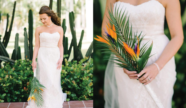 Bride holding a bouquet with areca palm