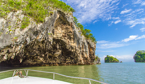 Boat overlooking remarkable rock formations