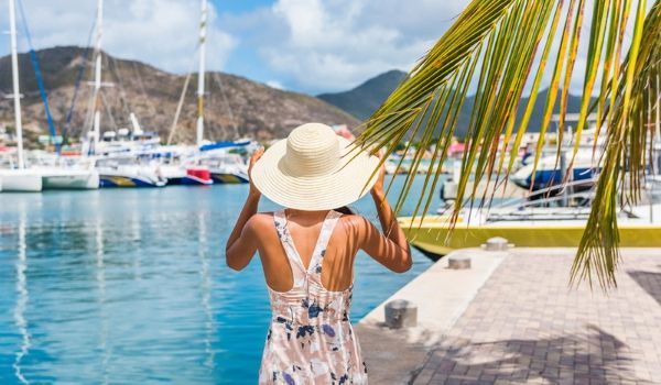 Woman walking along the marina in St Maarten