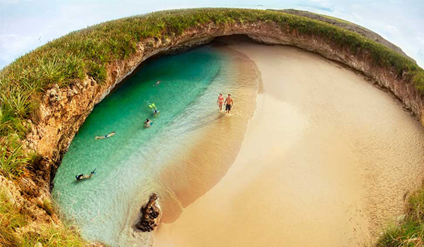 Aerial view of Hidden Beach's golden-sand shores