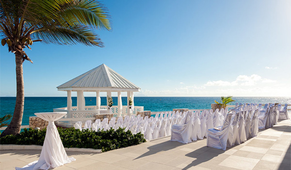 Wedding ceremony by a gazebo overlooking the ocean
