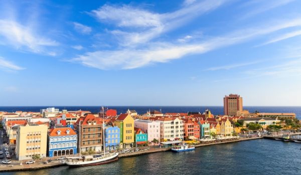 Colourful buildings lining the shore