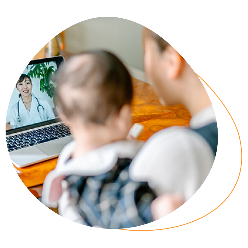 Woman and her child talking to a doctor via video