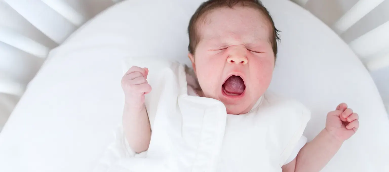 When do babies start sleeping through the night