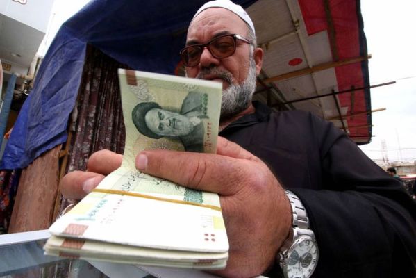 كيف تسحب إيران دولارات العراق؟