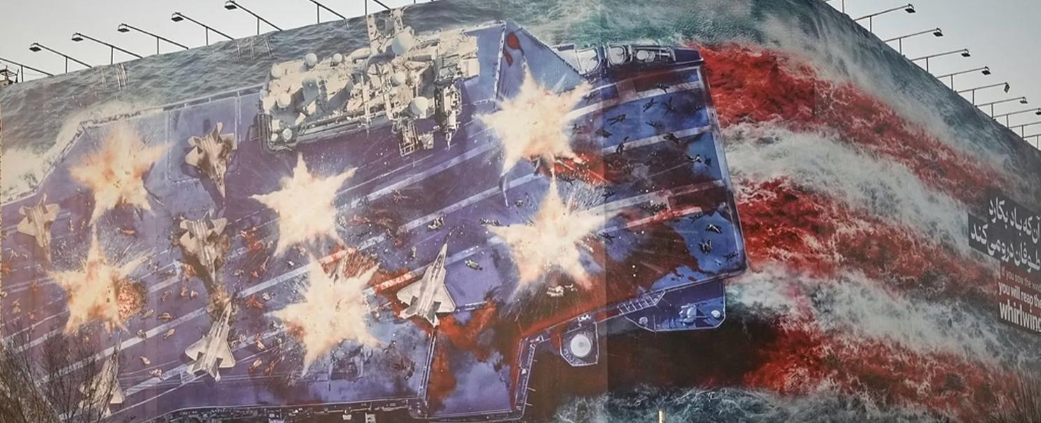 "من يزرع الريح يحصد العاصفة": جدارية جديدة وسط طهران تحذر واشنطن من أي هجوم