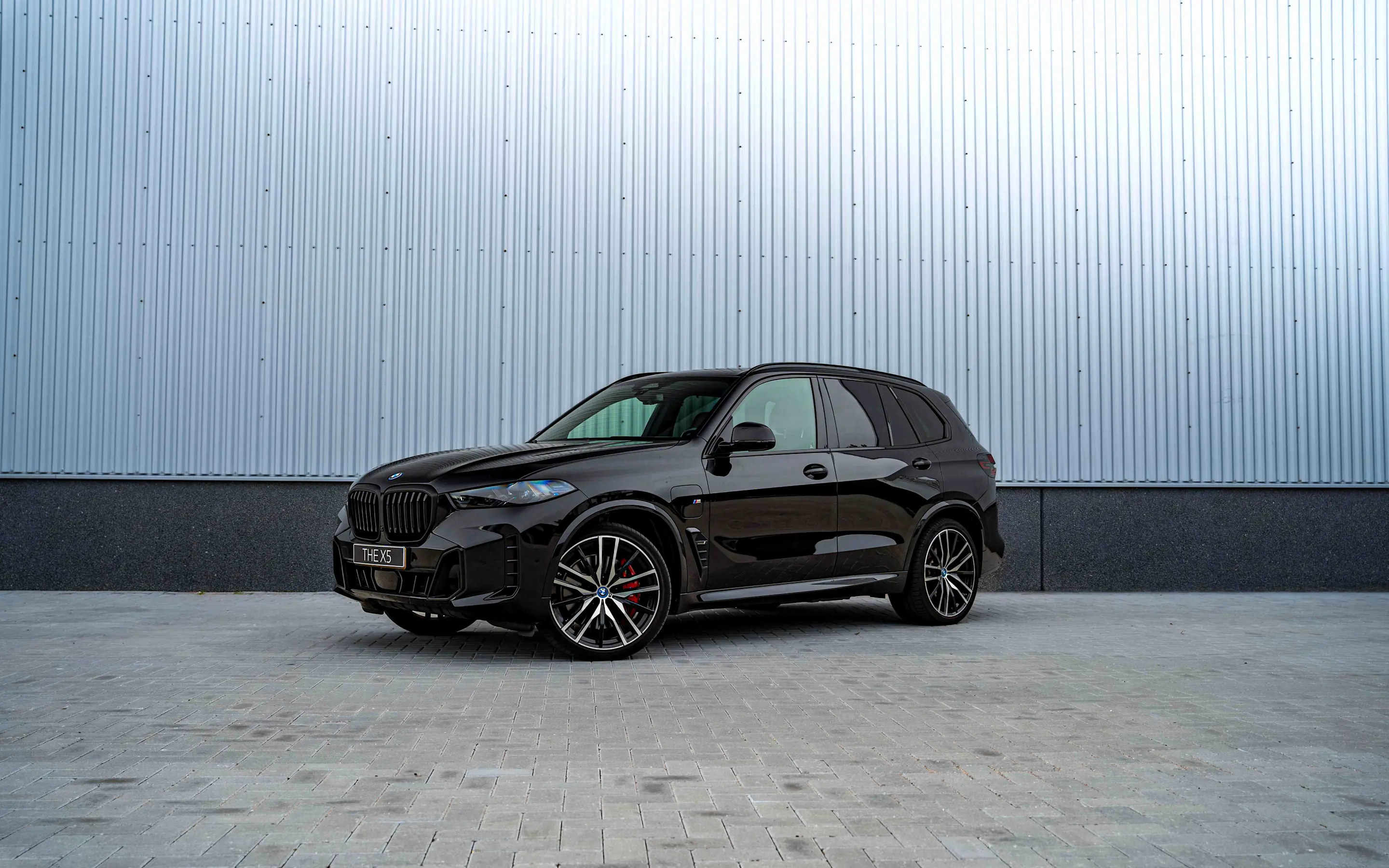 De zijkant van de BMW X5 - Afbeelding