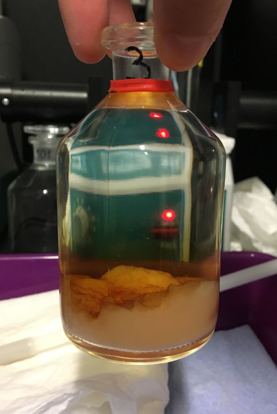 Acid addition turning the precipitate into brown jelly