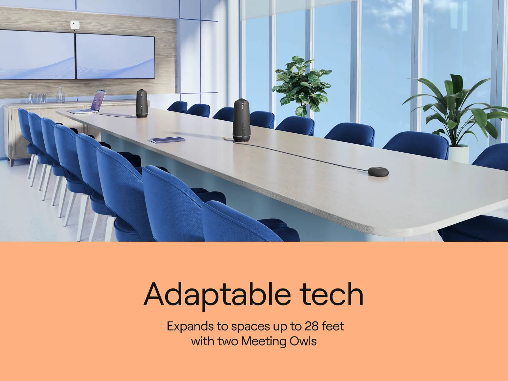 Modern conference room with two Meeting Owls to expand coverage up to 28 feet for hybrid meetings