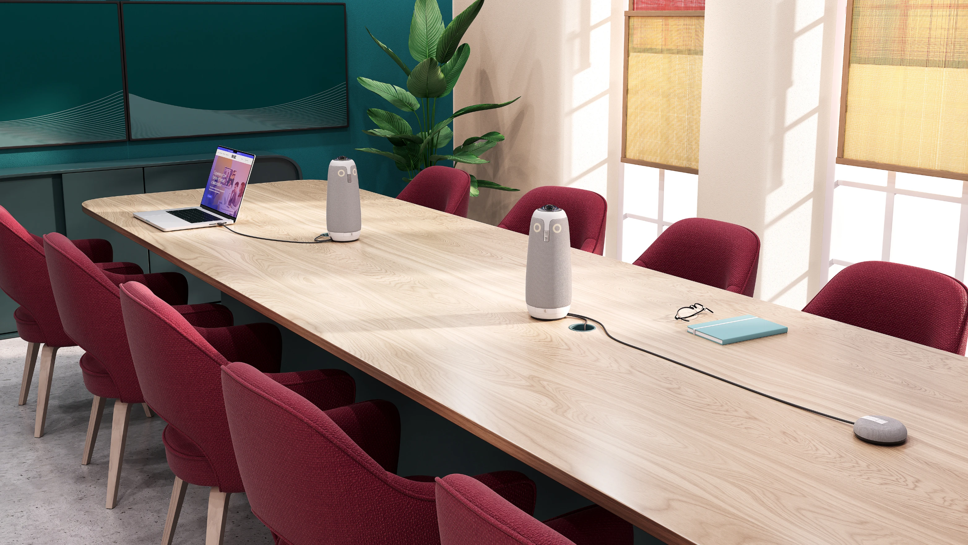 2 Meeting Owl 3 's and an Expansion Mic featured in a large conference room