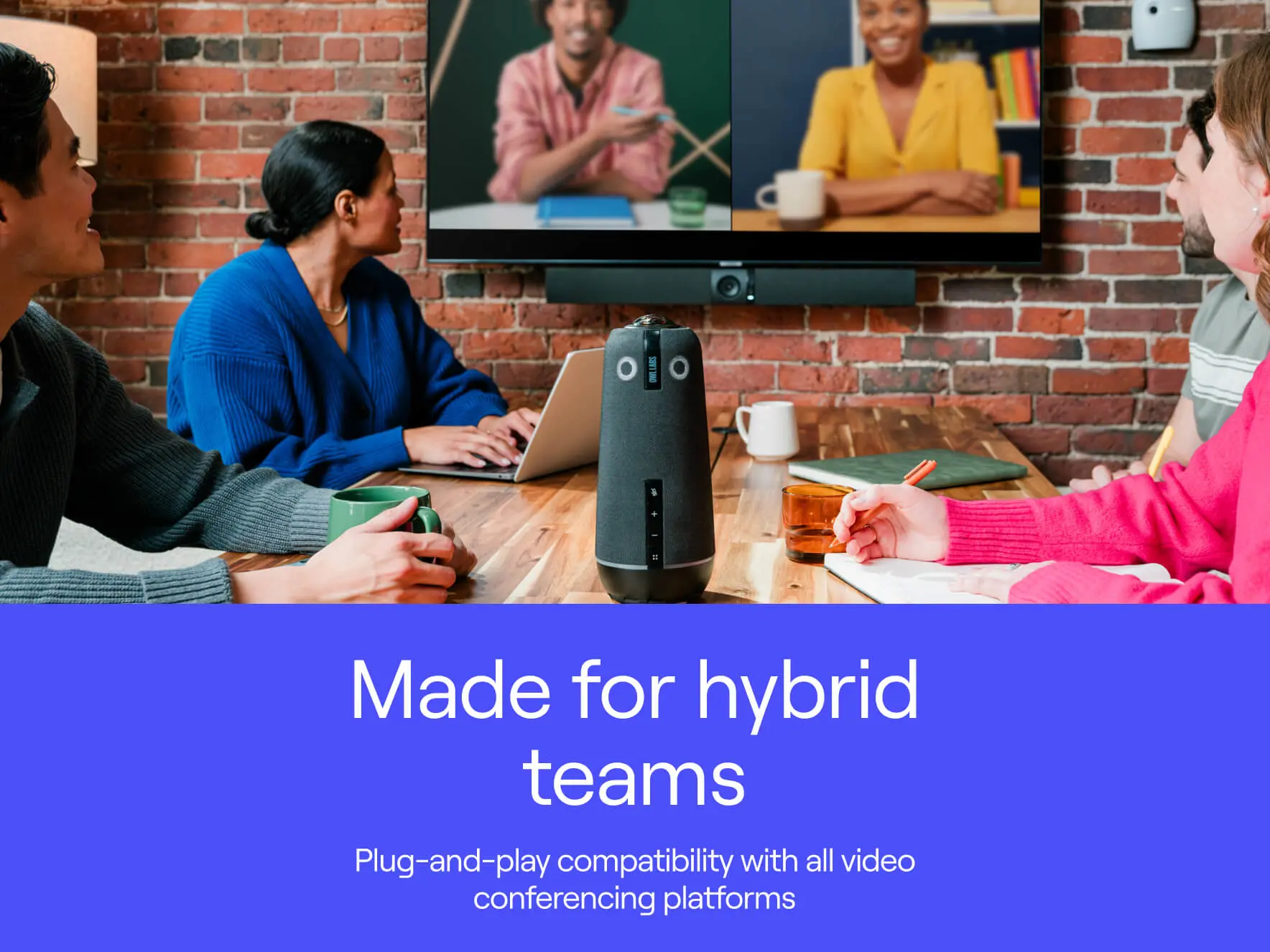 Group of professionals in a hybrid meeting using a video conferencing system with plug-and-play compatibility.