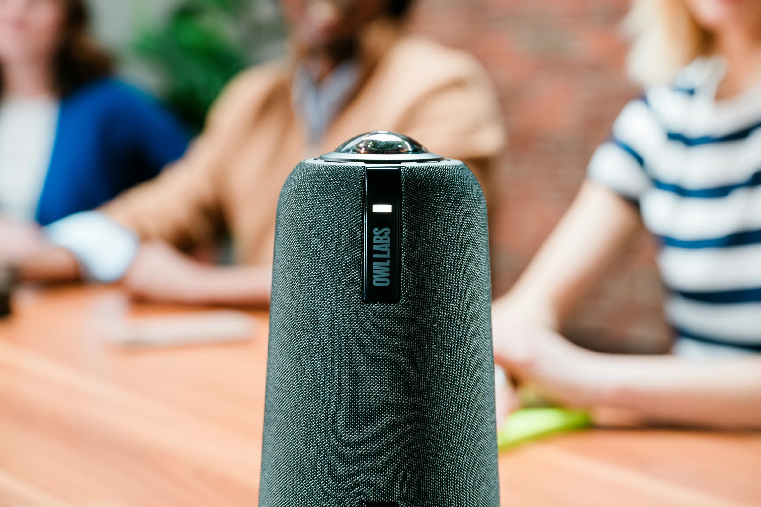 Meeting Owl 4+ featured in a video conferencing room