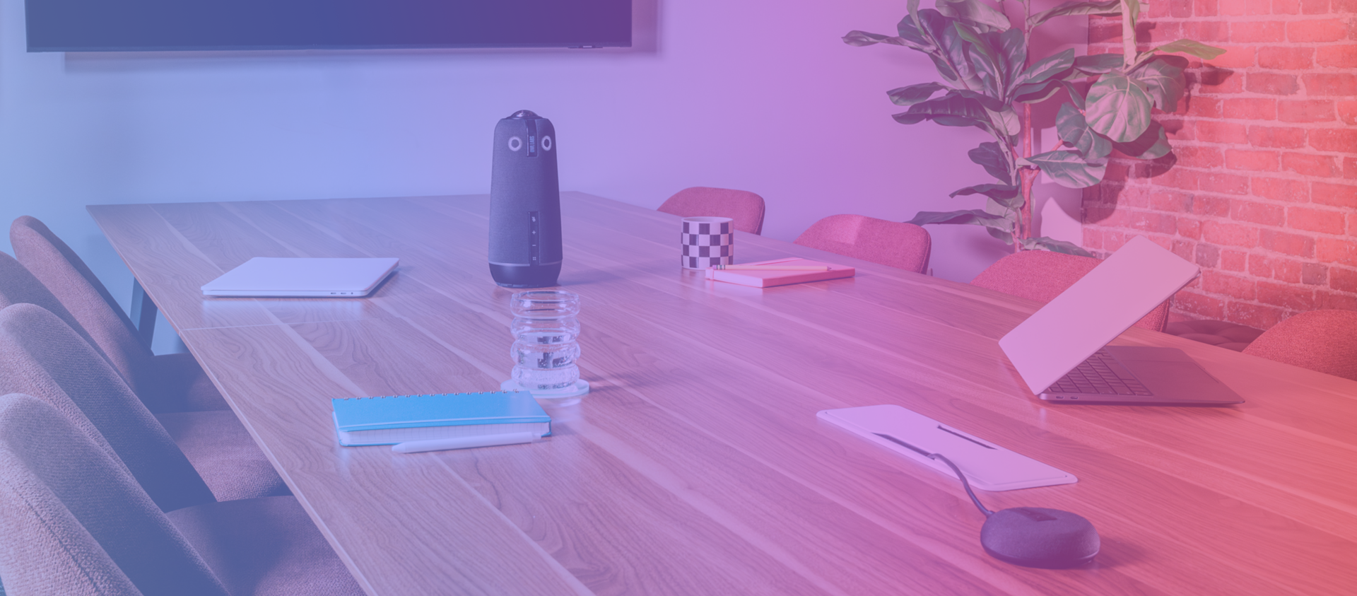 Meeting Owl 4+ and Expansion Mic Bundle featured in conference room setting