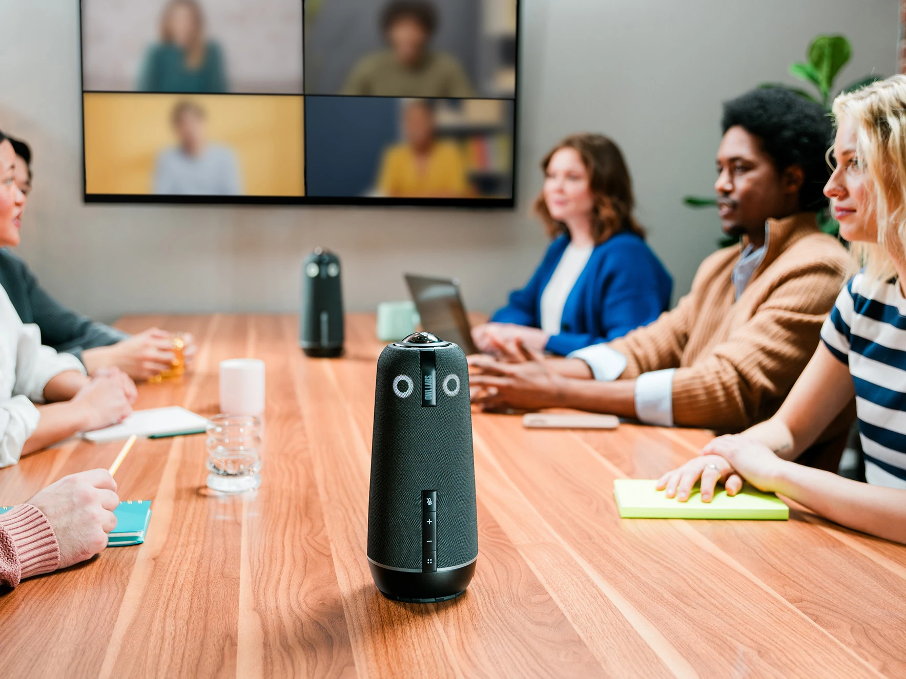 2 Meeting Owl 4+ featured in a hybrid conference room meeting