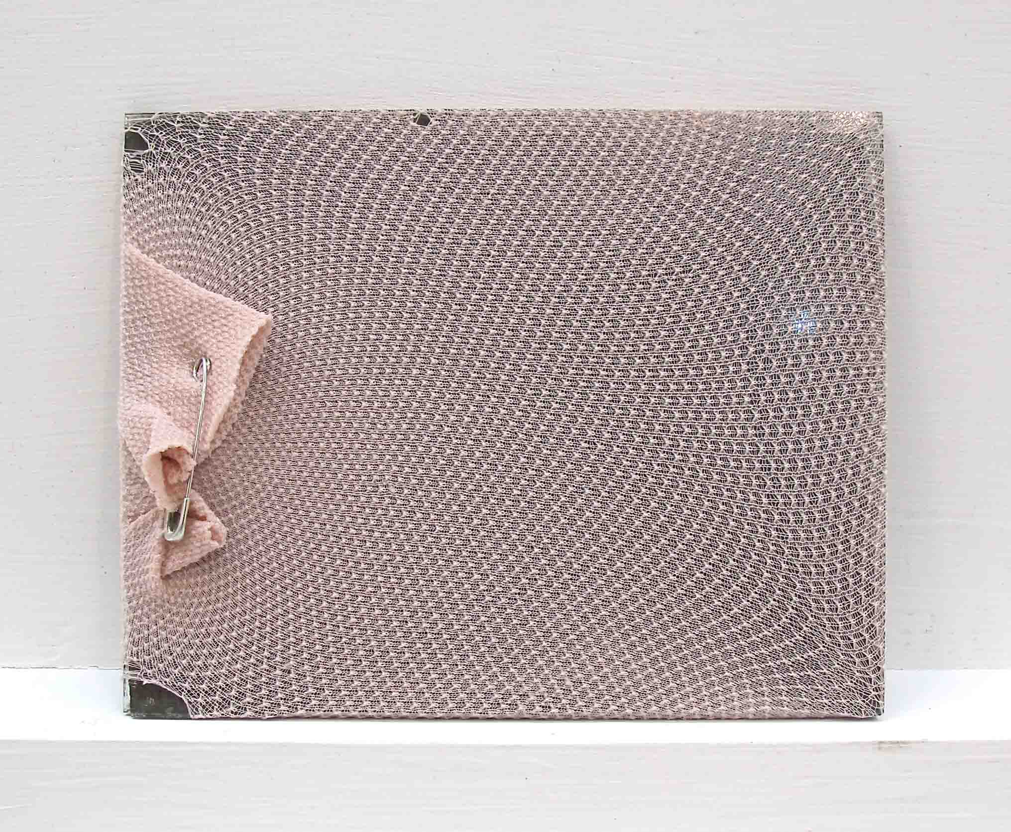 mirror-tights-safety-pin