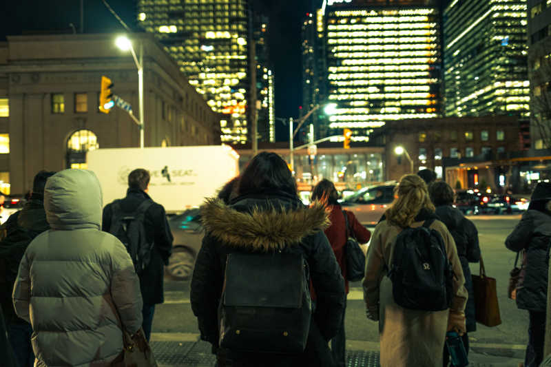 Photo of people downtown by Lli Tayyebi via Unsplash