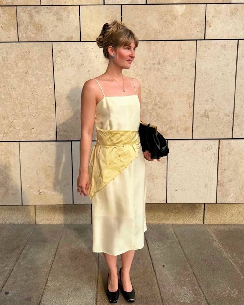Anne Johannsen wearing our Dumpling Clasp Bag and Shawl with Amber Beads during Copenhagen Fashion Week.