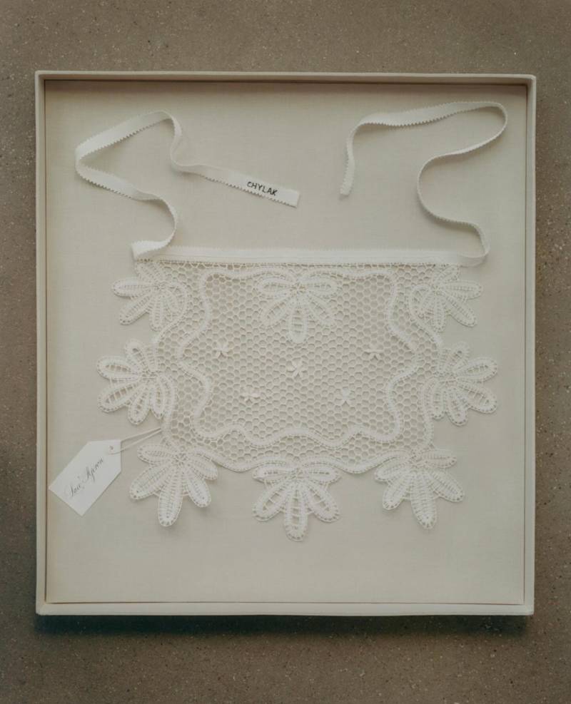 Linen thread apron handmade using a bobbin lace technique traditional to the town of Bobowa in southern Poland by local artisan Ewa Szpila.