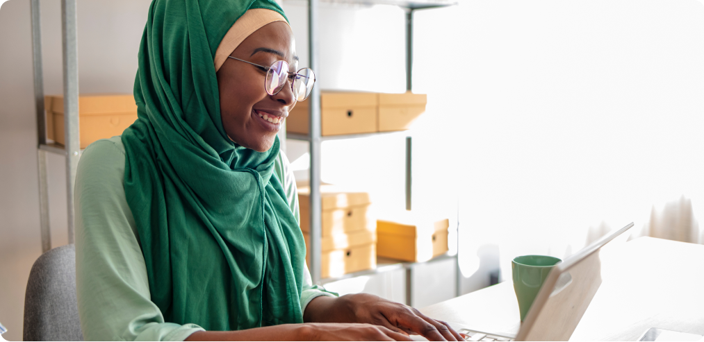 Woman looking at laptop