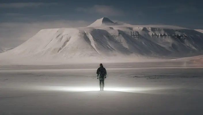 Northern Lights Hunting with Snowcat Hurtigruten Svalbard Photo George Cooper
