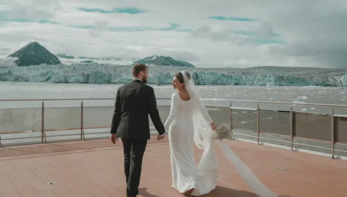 Wedding in front of a glacier on board MS Bard on Svalbard. Photo: Ragnhild Utne