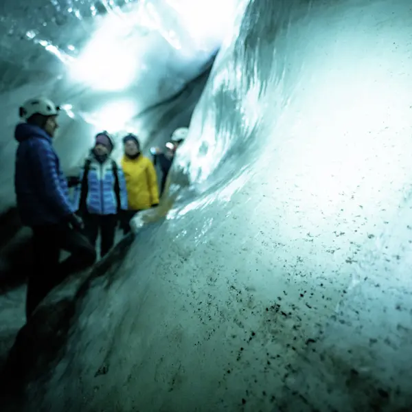 Ice cave with snowcat - Hurtigruten Svalbard - Photo Thomas Griesbeck