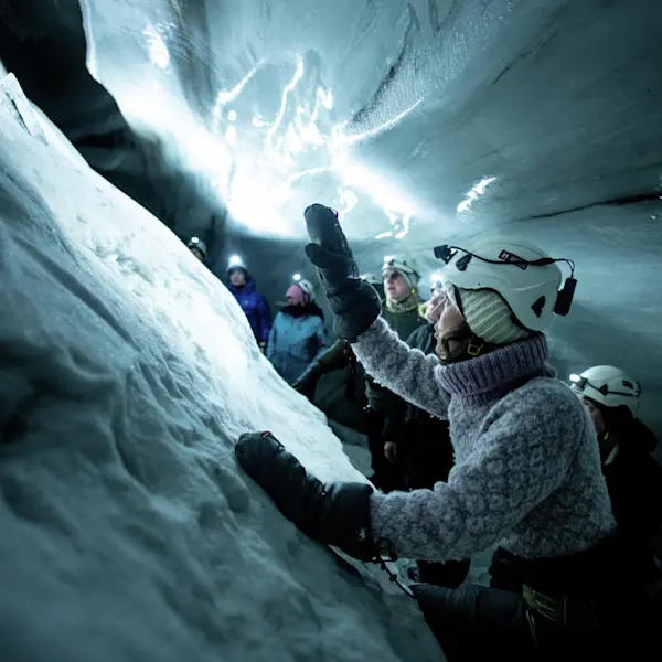 Ice cave with snowcat - Hurtigruten Svalbard - Photo Thomas Griesbeck