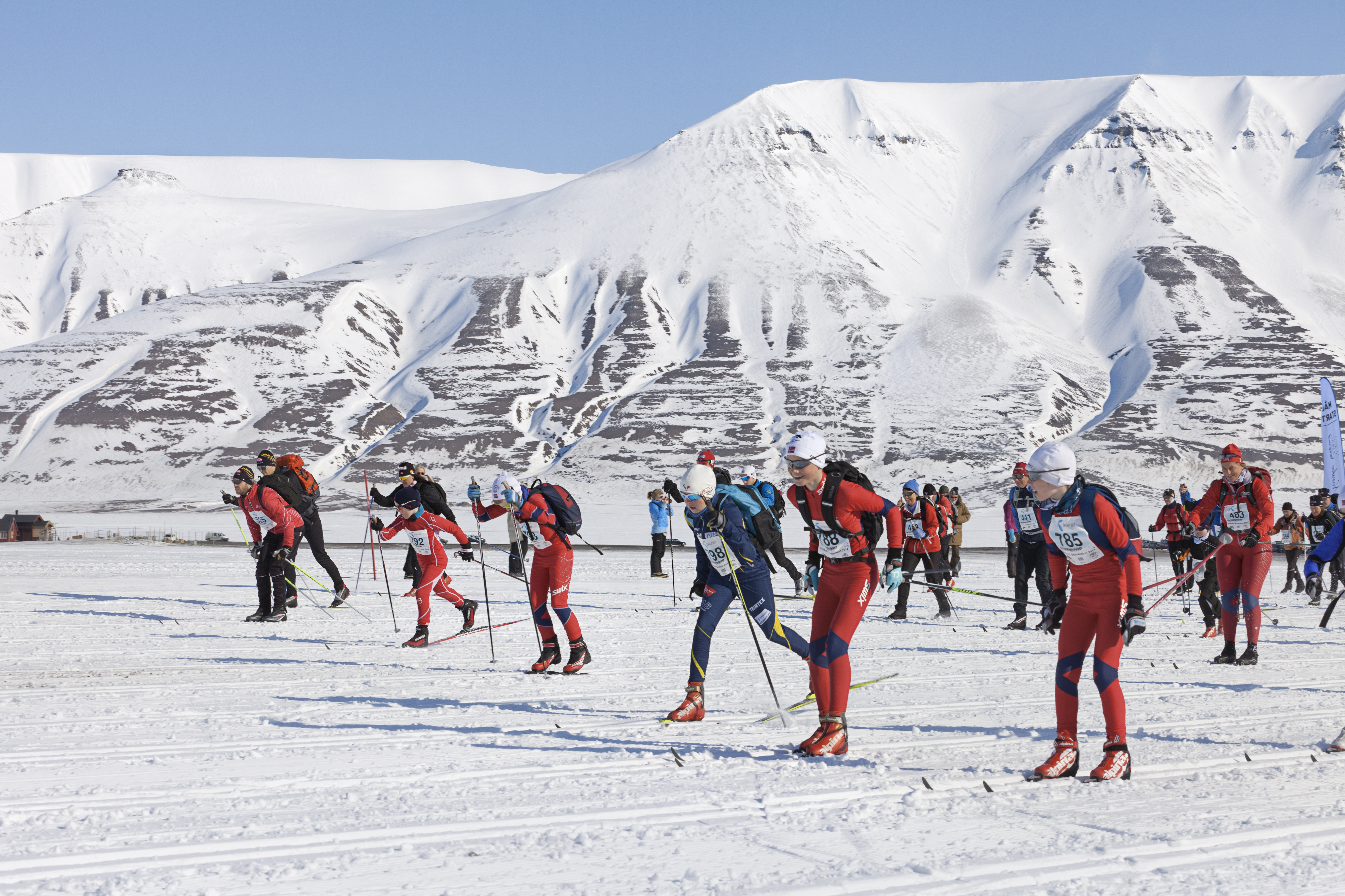 Athletes off the start of the Svalbard Skimarathon. Photo Credit: Hanne Feyling / Hurtigruten Svalbard