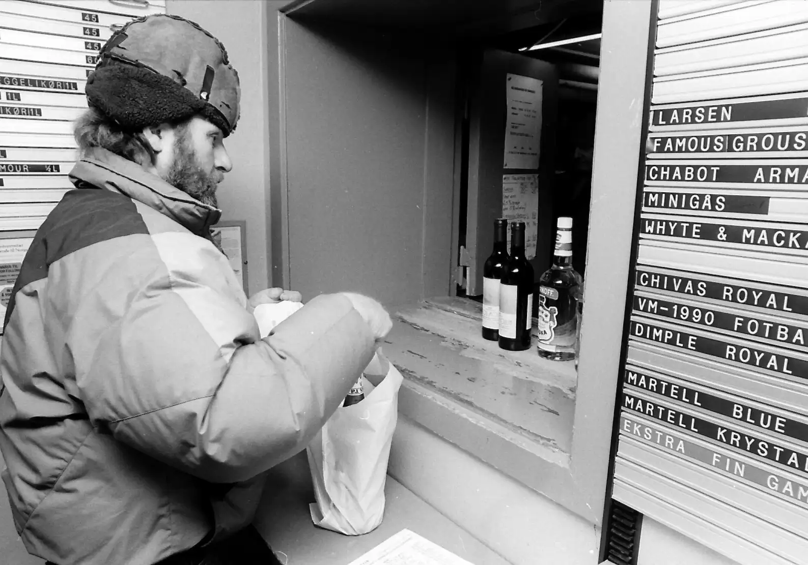 The service hatch at the Original Nordpolet was where locals of Longyearbyen came to buy alcohol during the 1950s and 60s. This hatch can still be found in the refurbished Champagne Cellar at Funken Lodge. Photo Credit: XXX