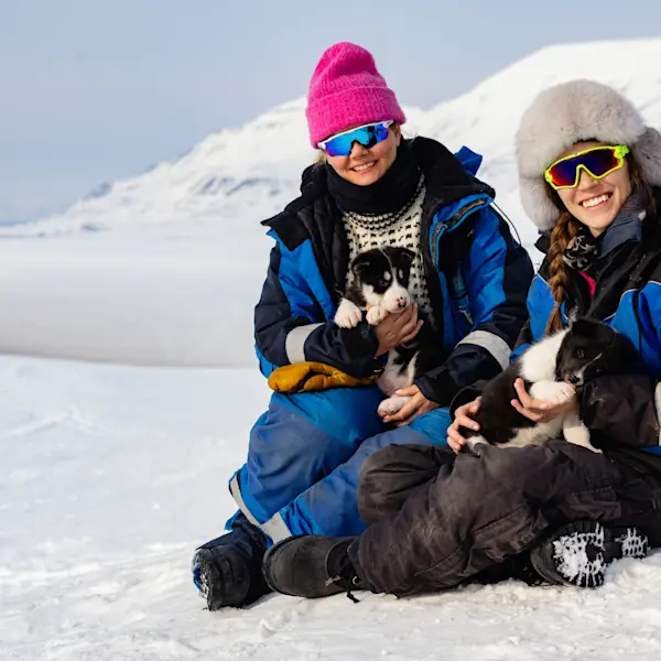 Hurtigruten Svalbard_Dog sledding to the ice cave_Photo Schibsted Partnerstudio
