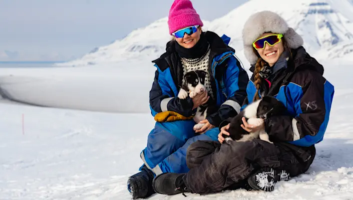 Hurtigruten Svalbard_Dog sledding to the ice cave_Photo Schibsted Partnerstudio