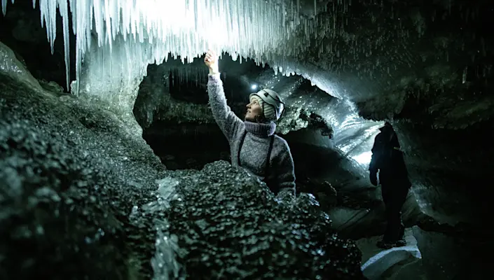 Ice cave with snowcat - Hurtigruten Svalbard - Photo Thomas Griesbeck