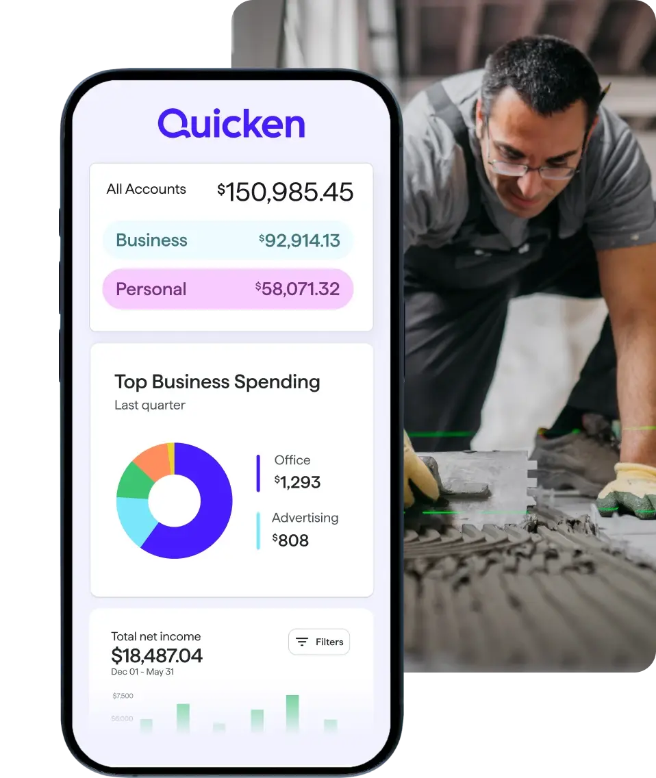 A composite image showing a smartphone screen on the left displaying a Quicken app dashboard with account balances, business and personal totals, a spending chart, and a net income graph. On the right, a person in work clothes bends over a surface, using tools to install or adjust rectangular tiles or panels.