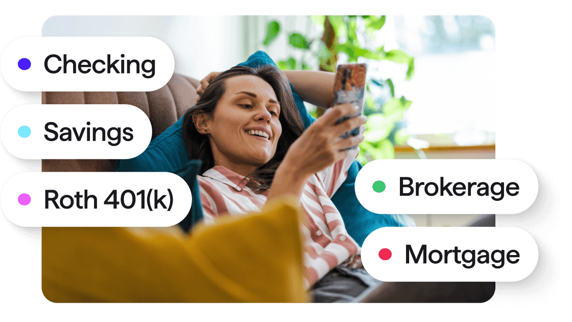 Photograph of woman sitting on couch, looking at her phone. Multiple account types in Quicken including Checking, Savings, Roth 401(k), Brokerage, and Mortgage displayed as floating tags.