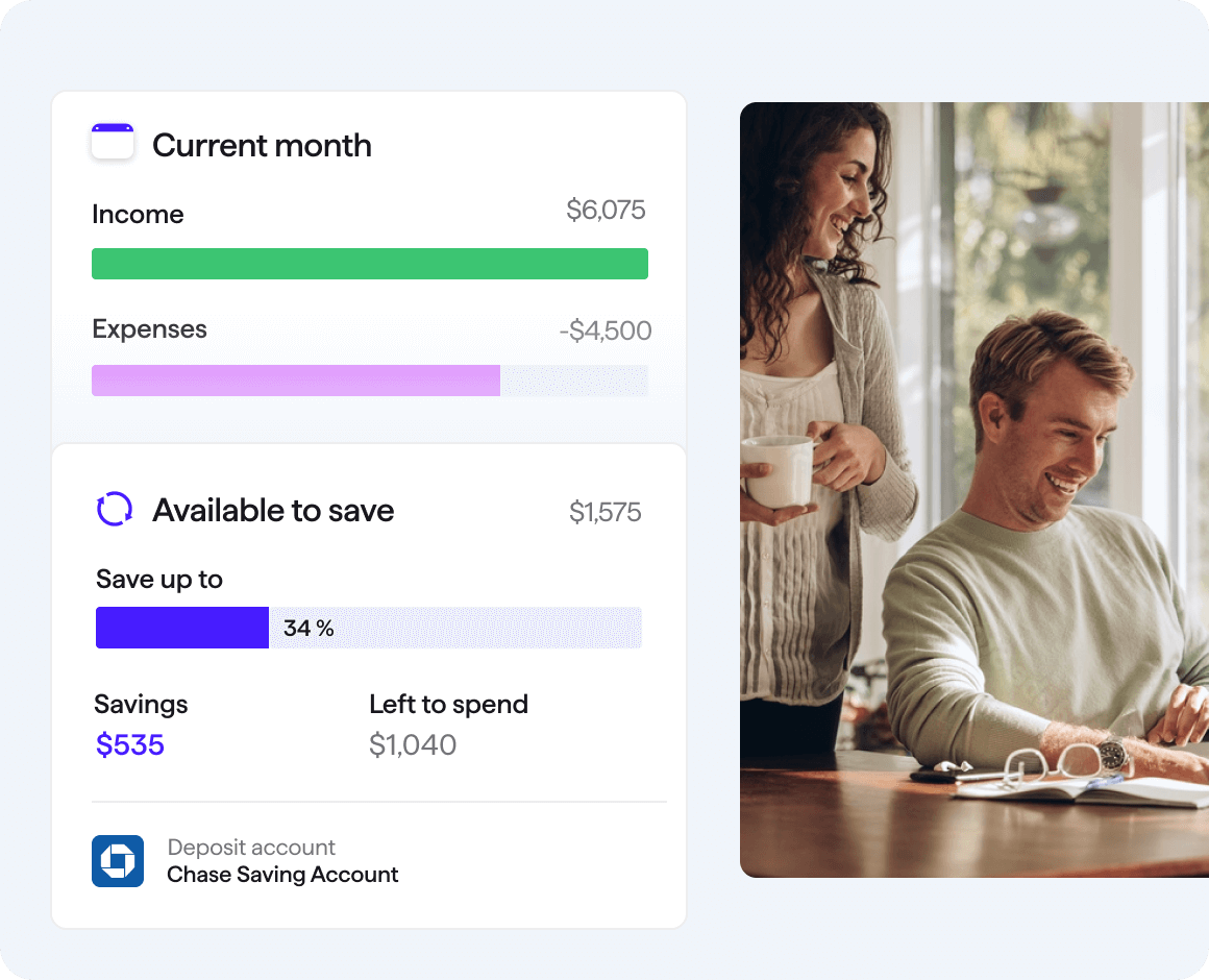Couple smiling while looking at Quicken Simplifi current month income versus expenses and monthly savings progress bar user interface together