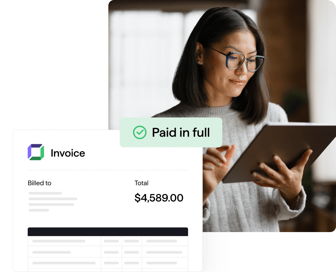 A woman looks at a tablet while reviewing an invoice interface showing a total of $4,589. A green banner with a checkmark reads “Paid in full.”