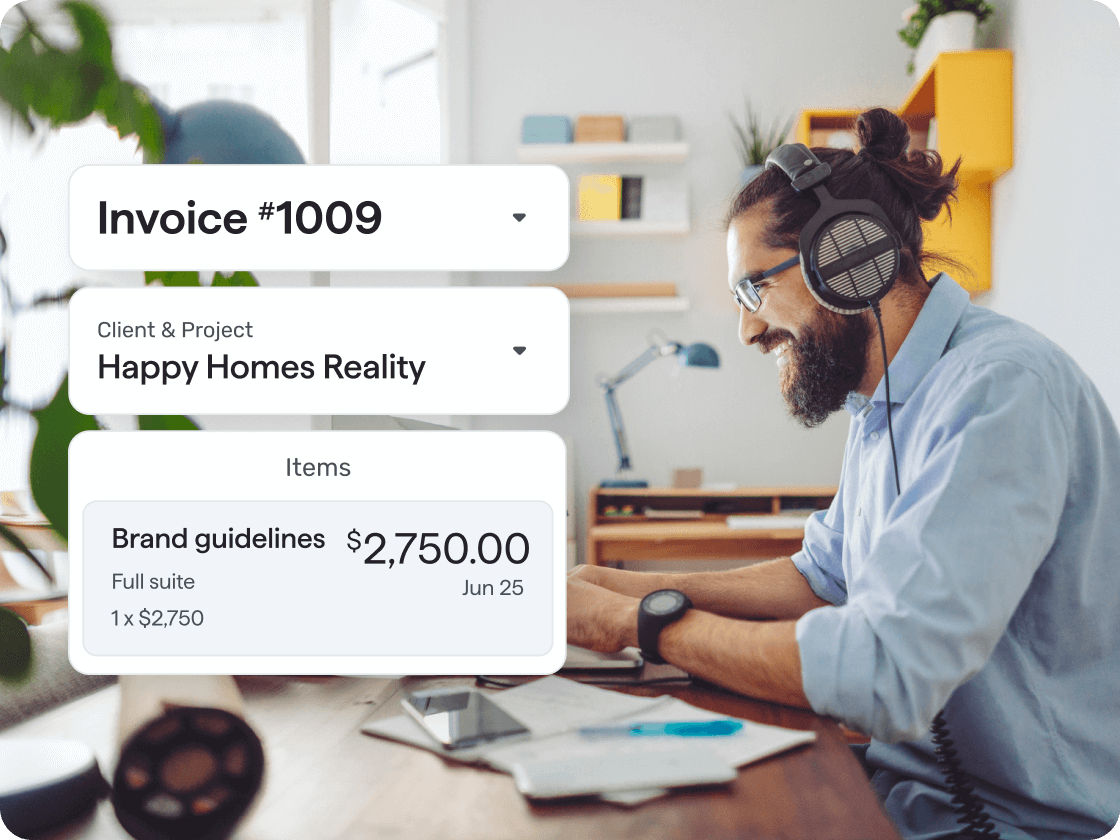 A man wearing headphones works at a desk with a laptop. Overlaid invoicing details show Invoice #1009 for a client called Happy Homes Realty, including an item for brand guidelines priced at $2,750.