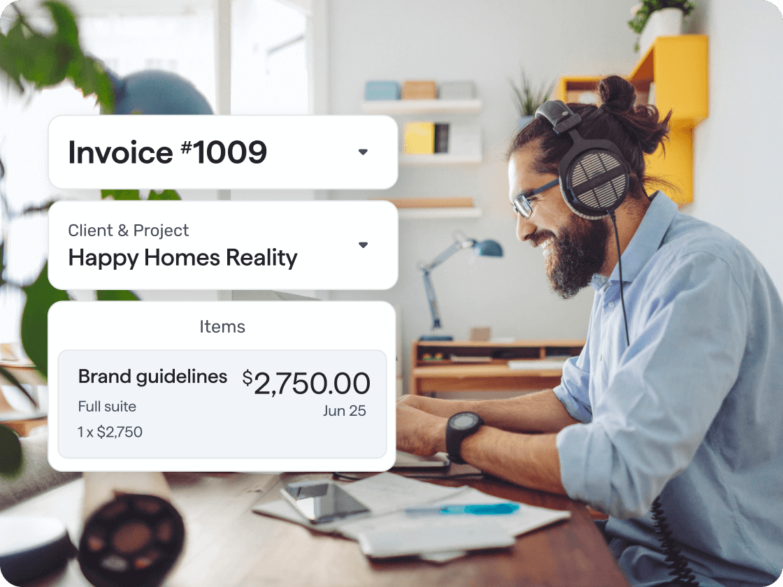 A bearded man wearing headphones and glasses is sitting at a desk, working on a computer. Overlapping the image is an invoice with description and cost of services.