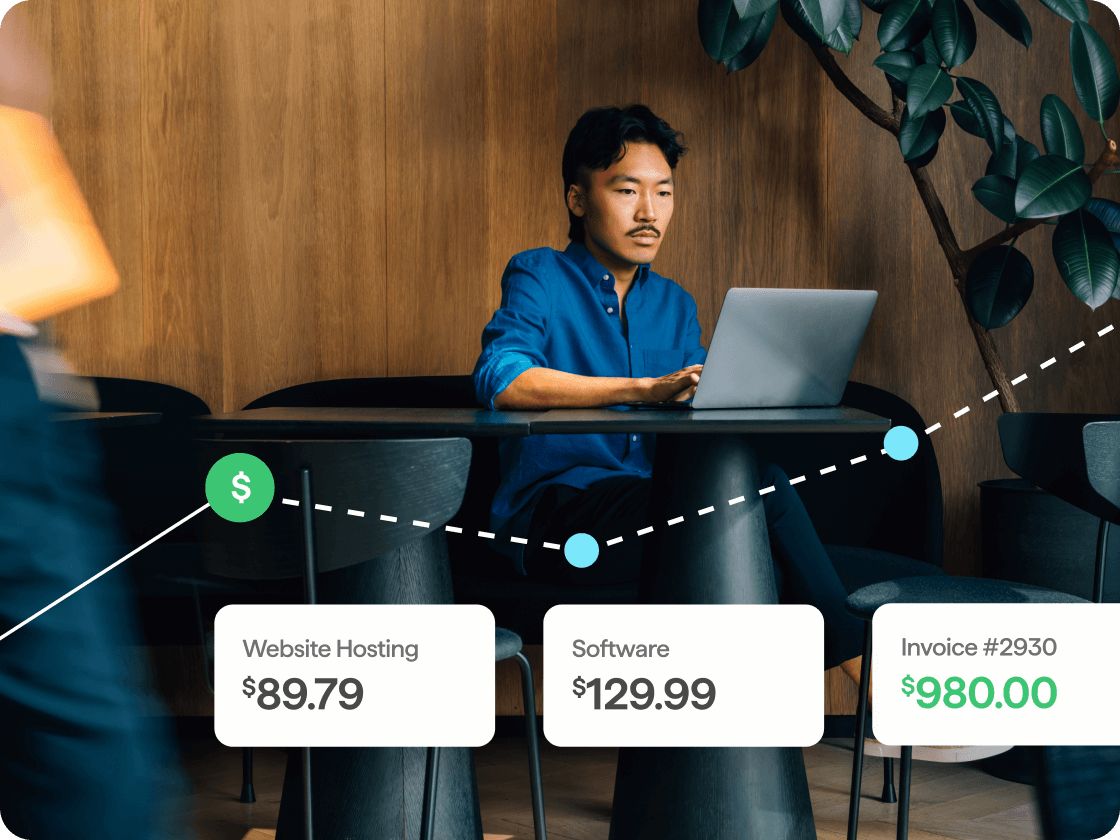 A man sits at a laptop. Overlaid graphics show a rising financial line with labeled expenses, including website hosting for $89.79, software for $129.99, and an invoice for $980.00.