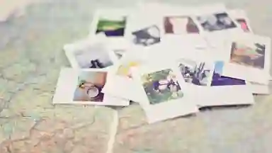 Colorful polaroid pictures on a map
