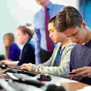 A teacher spots a student texting in class.