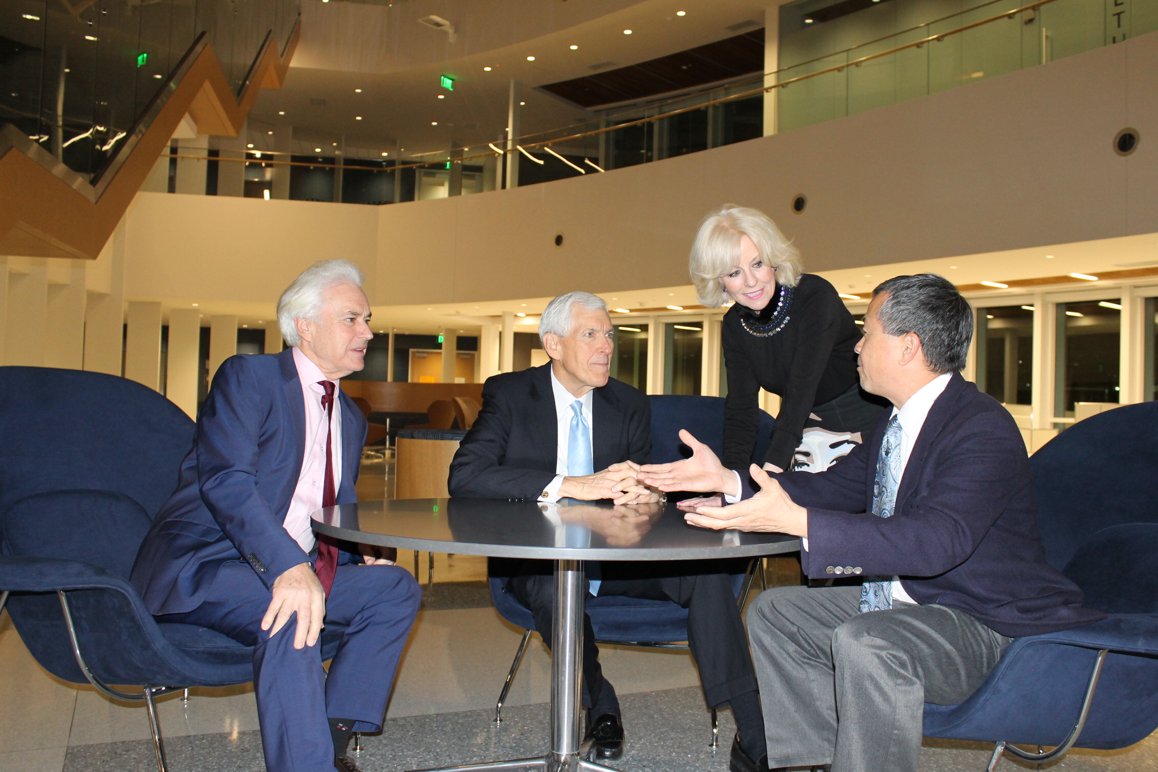  Sandi Chapman, PhD, with Project co-leaders ian Robertson, PhD, Tom Leppert and Geoff Ling, MD, PhD.