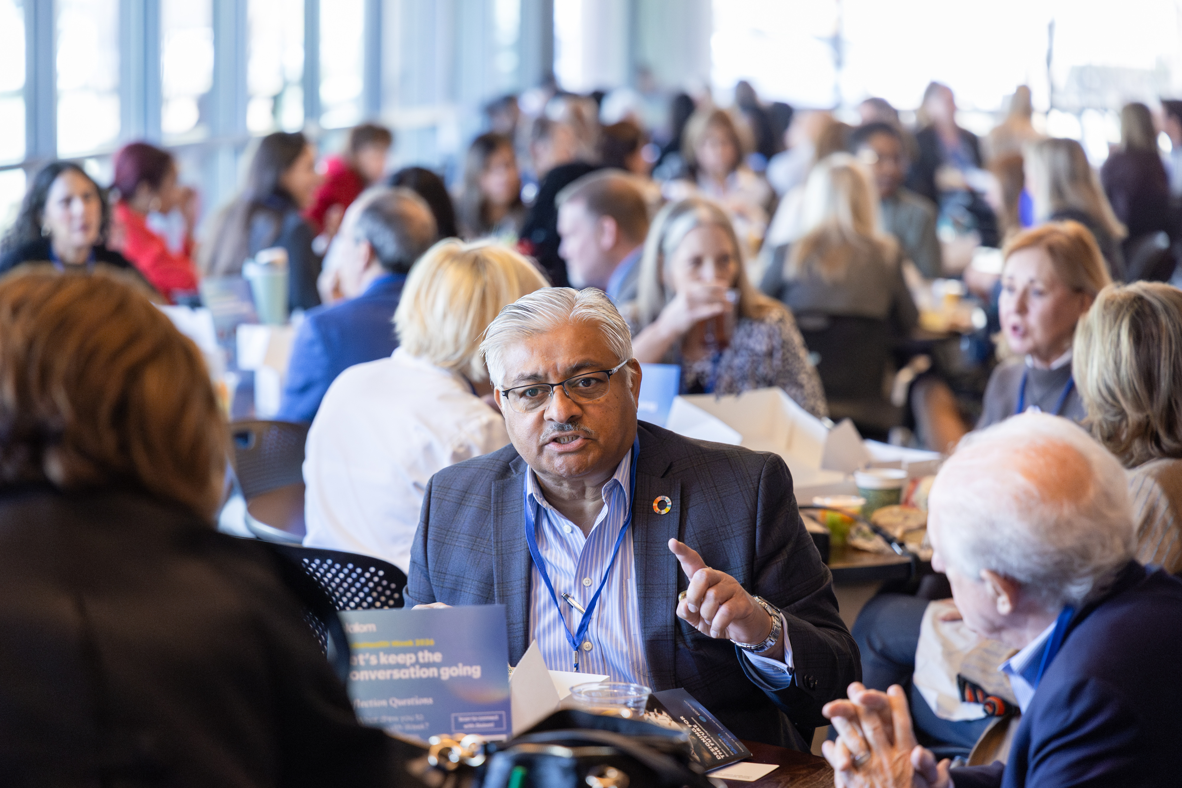 Participants enjoy lunch at the Designing for the Future workplace conference at BrainHealth Week 2026 in Dallas, Texas.