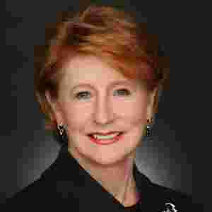 Woman white red hair wearing a black shirt - Headshot