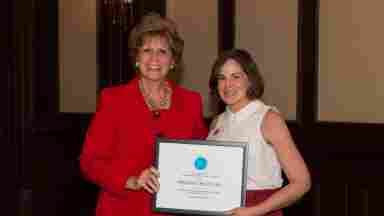 Erin Venza MS, CCC-SLP and Kate Juett showing Friends of BrainHealth Distinguished Scientist Award in 2017, made possible by the Sapphire Foundation.