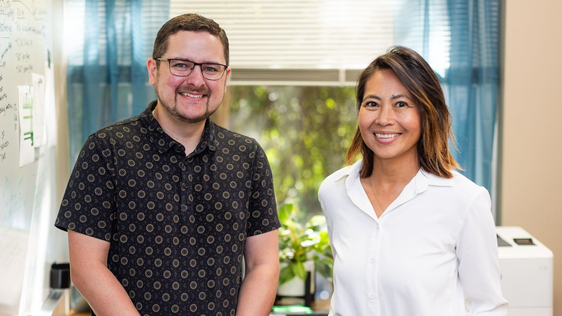 Sherwood (Tracy) Brown, PhD, and Francesca Filbey, PhD, have previously studied whether poorer learning and memory performance in individuals with cannabis use disorder are due to cannabis-related sleep problems, pictured together in a sunlit workroom.