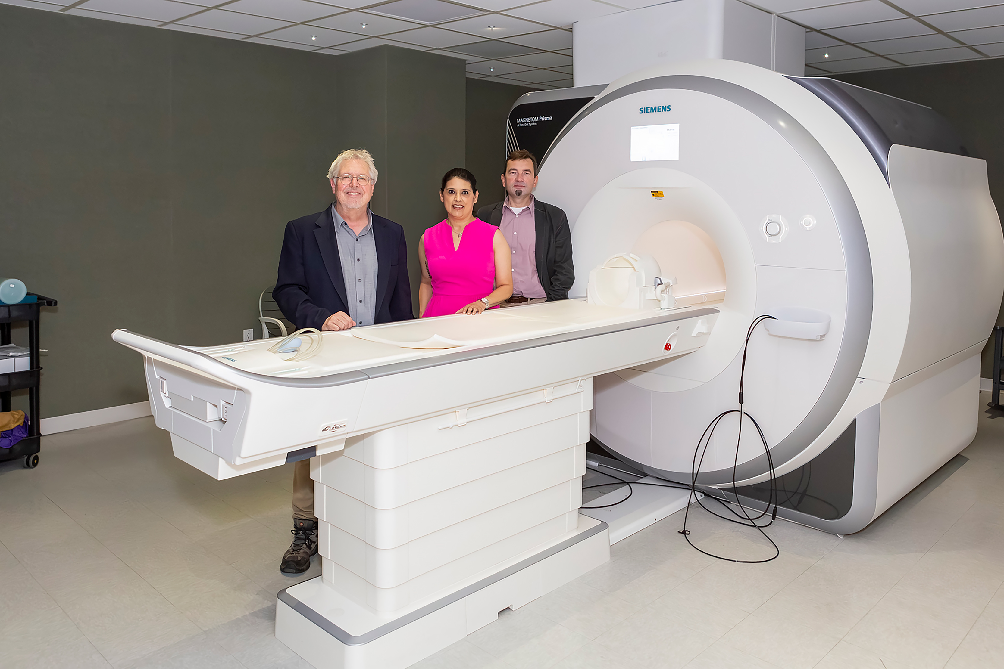 Meet the Sammons BrainHealth Imaging Center Team: Bart Rypma, PhD, director; Angela Plata, administrative coordinator; and Sergey Cheshkov, PhD, research scientist.