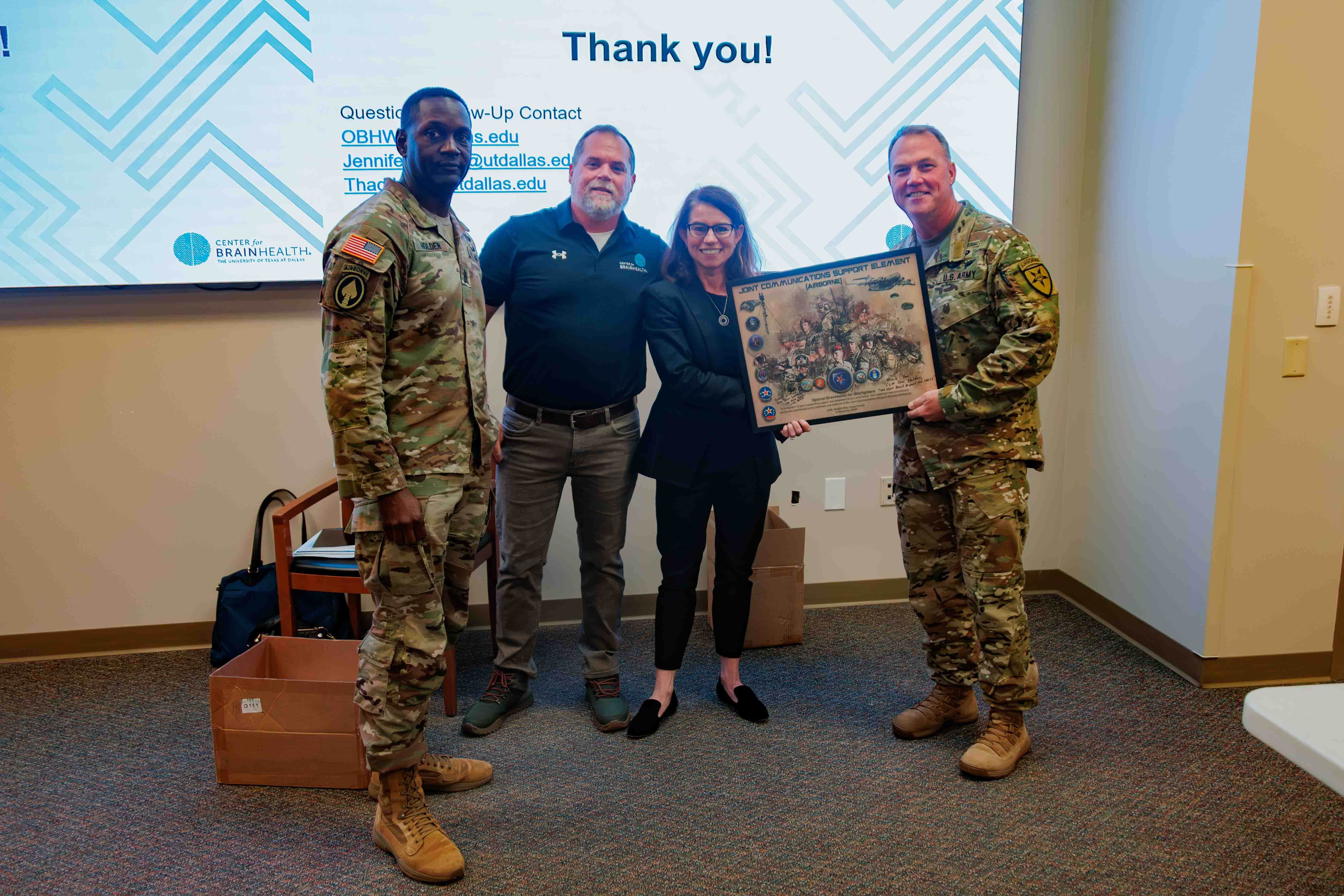 Center for BrainHealth's Jennifer Zientz and Thad King with service members participating in Optimal BrainHealth for Warfighters, following a SMART seminar with the Joint Communications Support Element (JCSE) at MacDill AFB, FL. The JCSE is a joint command (Army, Navy, Airforce and Marines).