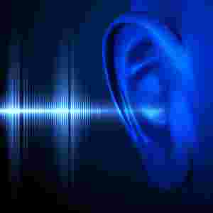A blue sound wave against a black background; there is a dark blue rendition of an ear receiving the sound wave.